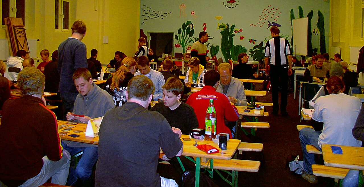 Two players deep in a game of Magic: The Gathering