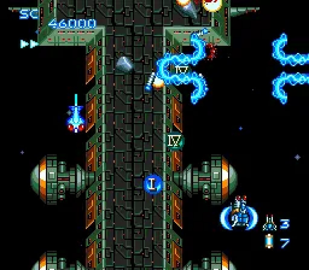 Blazing Lazers gameplay on TurboGrafx-16, the Gunhed starfighter threading a station corridor with its blue weapon firing