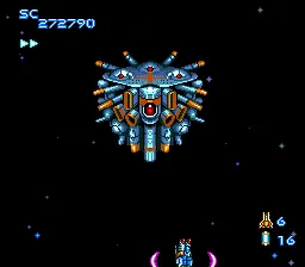 A late-area Blazing Lazers boss, a multi-turreted warship filling the screen