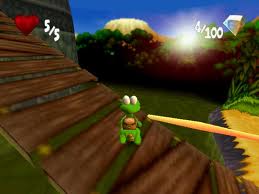 Croc on a wooden ramp in the 1999 original Croc 2, with hearts and crystal counters on screen