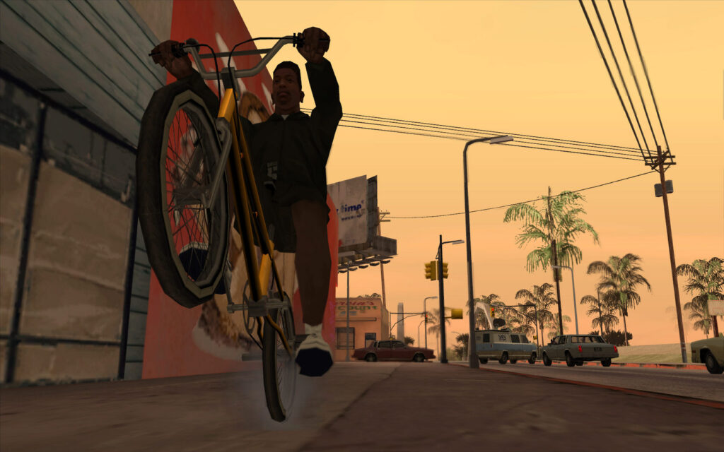 Grand Theft Auto: San Andreas — CJ pops a wheelie on a BMX in Los Santos