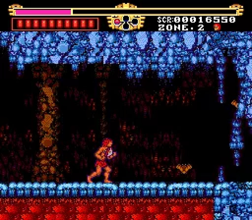 The ice caves of Zone 2 in The Legendary Axe, Gogan on a frozen ledge