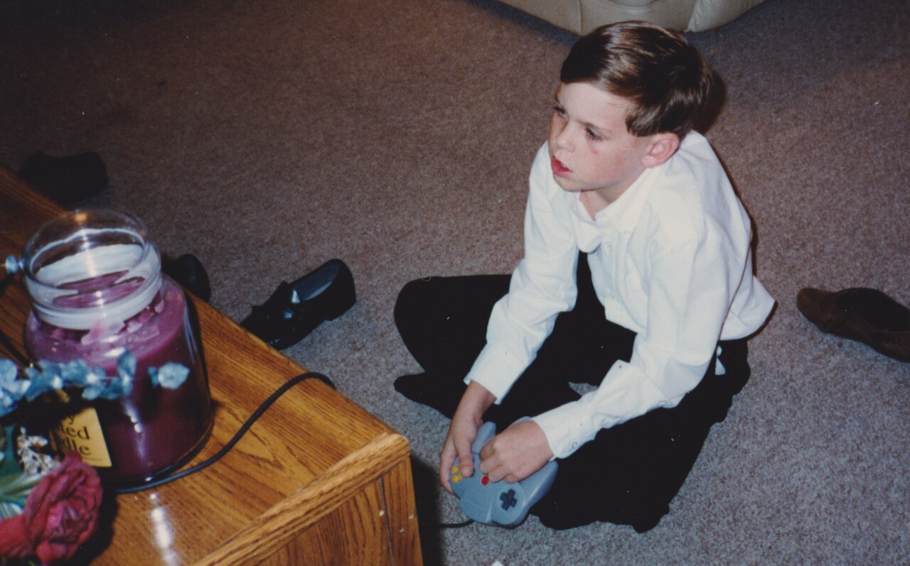 Playing the Nintendo 64 in 1996.