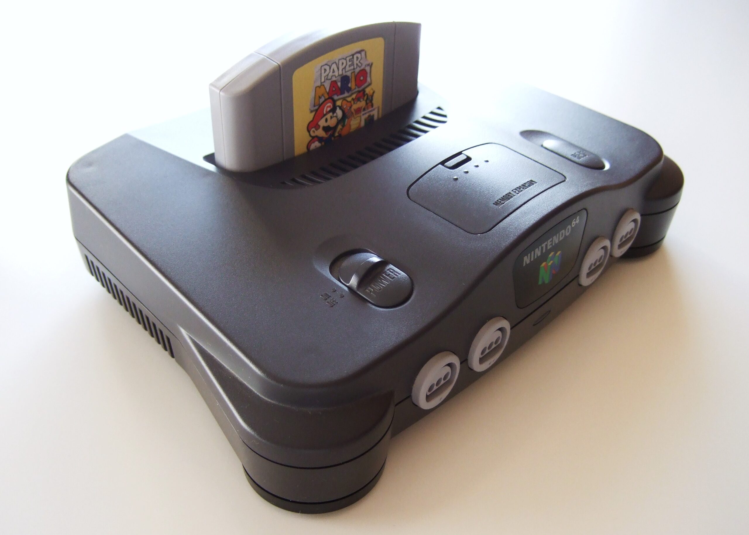 Paper Mario cartridge inserted in a Nintendo 64 console