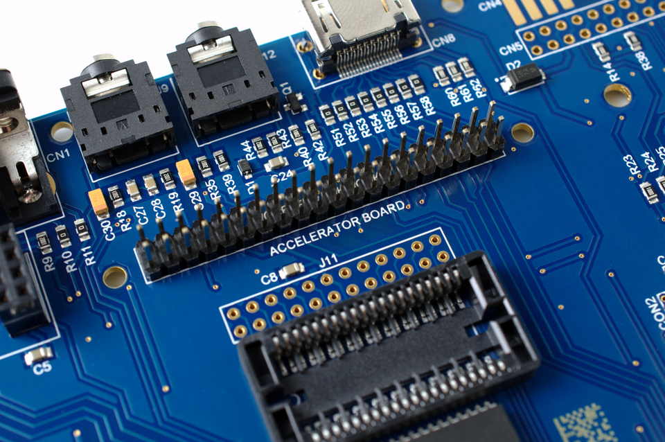 Detail of the ZX Spectrum Next board showing joystick ports, SD slot and the Accelerator Board header