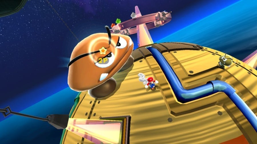 Mario facing a giant enemy on a golden planetoid in Super Mario Galaxy on Wii