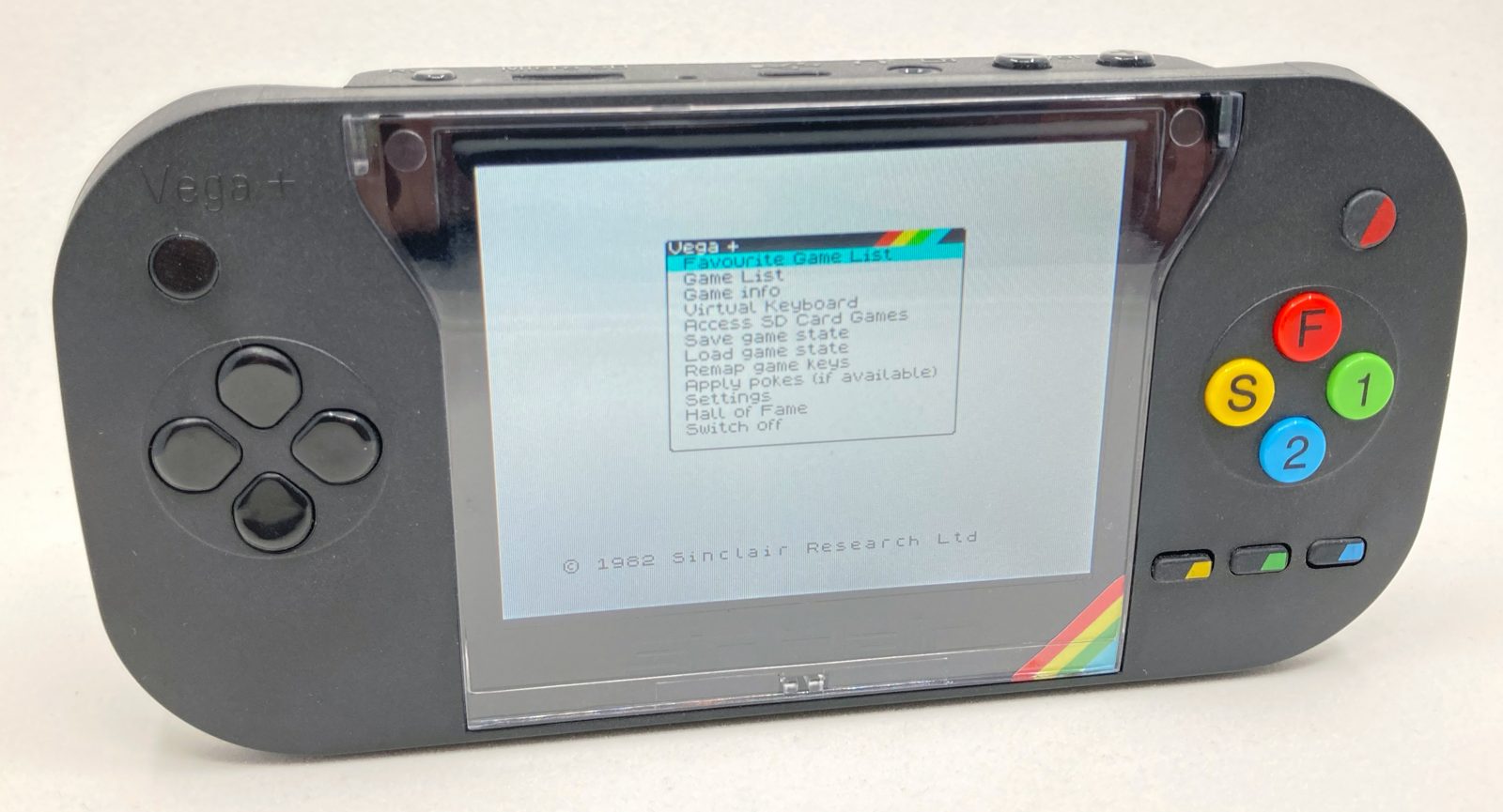 A Vega+ that actually exists: one of the few hundred delivered units, switched on at its menu in August 2018. Note the rainbow stripe, the coloured buttons — and the protective film still on the screen.